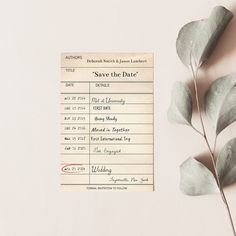 a wedding save the date card next to a leafy branch on a white background