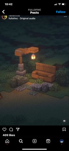 the screenshot shows an image of a bench and fire pit in a park at night