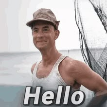 a man standing next to a net with the words hello written in front of him