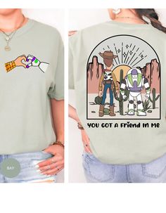 Embark on a nostalgic journey with our "Toy Story Harmony: You've Got a Friend Tee." This cotton t-shirt, inspired by the iconic Toy Story duo Buzz and Woody, brings the magic of friendship to life. On the back, a heartwarming scene unfolds as Buzz and Woody extend their hands, symbolizing the timeless bond of camarade Daisy Crafts, Buzz And Woody, Oopsie Daisy, Dance Marathon, Toy Story Shirt, Woody And Buzz, Friends Tee, Disneyland Shirts, Aunt Shirts