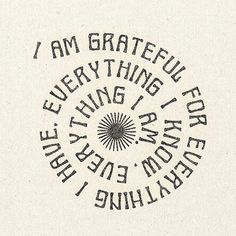 the words are written in black and white on a piece of paper that says i am grateful everything is here