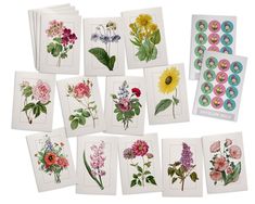 a bunch of cards with flowers on them and some stickers next to each other