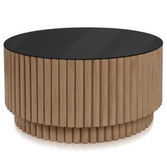 a round wooden table with black top