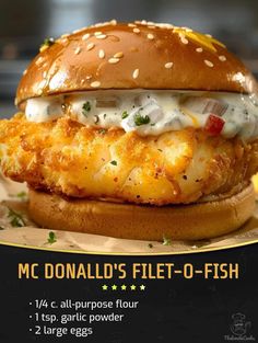 an advertisement for mcdonald's fish sandwich with cheese and sauce on the buns