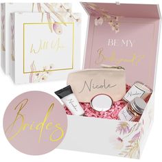 the bride's gift box is shown with its contents in pink, white and gold