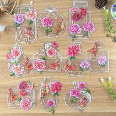 the flowers are cut out and placed on the table to make decorative wall hangings