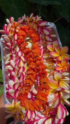 a bunch of flowers that are sitting on a table