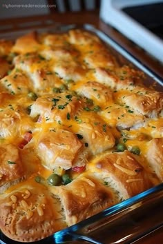 a casserole dish filled with meat and cheese