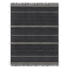 black and white striped rug with fringes