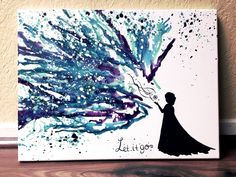 a painted canvas with a silhouette of a woman holding an umbrella