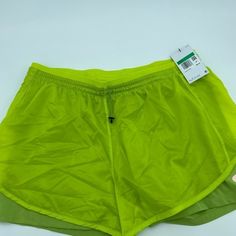 Nike Women’s Xl Nwt 3” Inseam On Outer Shorts 6” On Inner Legging Short A Water-Repellent Shell Provides The Outer Layer Of These Ready-To-Run Shorts With Second-Skin Bike Shorts Layered Underneath. 100% Nylon With 84% Polyester, 16% Spandex Contrast Machine Wash, Line Dry Green Athletic Shorts For Sports In Spring, Green Athletic Shorts For Spring Sports, Spring Green Athletic Shorts For Sports, Nike Green Moisture-wicking Athletic Shorts, Nike Green Moisture-wicking Shorts, Nike Green Moisture-wicking Bottoms, Green Nike Shorts For Running, Nike Green Running Shorts, Green Training Shorts For Spring