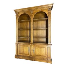 an old wooden bookcase with two doors