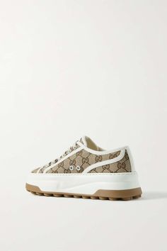 GUCCI Logo-jacquard canvas sneakers | NET-A-PORTER Gucci Canvas Shoes, Sporty Beige Sneakers With Logo, Beige Lace-up Sneakers With Logo, Beige Logo Sneakers For Streetwear, Gucci Luxury Sneakers With White Sole, Luxury Gucci Sneakers With White Sole, Beige Embroidered Logo Sneakers For Streetwear, Beige Sneakers With Embroidered Logo For Streetwear, Luxury Canvas Sneakers With Round Toe