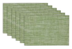 four green placemats on a white background