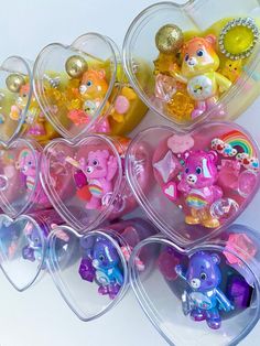 several heart shaped plastic toys are in the shape of hearts