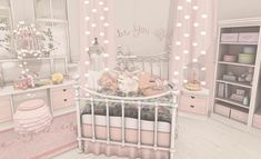 a baby's room with pink furniture and lights on the walls, including a crib