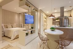 a bedroom with a bed, kitchen and dining area