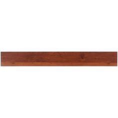 a wooden shelf that is on top of a white wall and has wood grains