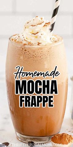 homemade mocha frappe recipe in a glass with whipped cream and cinnamon on top