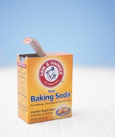 a box of baking soda sitting on top of a counter