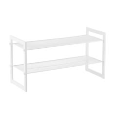 a white shelf with two shelves on each side