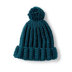 a blue knitted hat on a white background