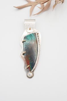 "Listing is for Contemporary Art Studio Designer Sterling Silver Chrysocolla 14k gold accents Cubic Zirconia Architectural Pendant. Beautifully crafted, Art Studio Designer piece.  Marked sterling and 14k gold. Pendant measures 2.8\" x 0.9\". Weight is 21.8 grams.    Good vintage condition!  Thank you. (N121)" Metal Art Jewelry, Astrology Jewelry, Mixed Metal Jewelry, Precious Metal Clay, Art Pendant, Cabochon Pendant, Silver Art, Gold Accent, Modern Pendant