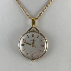 Vintage Working 1965 M5 Bulova Pendant, Purse Or Pocket Watch With A 10k Rolled Gold (Gold Filled) Case #I170624. This Watch Is Waterproof, Anti-Magnetic, And Shock Resistant. 1.25 Inch In Diameter, 3 Gold Hands And Accents ,Well Cared For. Case Opens From The Front To Service. Comes With A 24 Inch Italian 925 Silver Vermeil (22k Gold Plated) Rope Chain Necklace. Engrave On Reverse See Pictures Rope Chain Necklace, Gold Work, Gold Hands, 22k Gold, Rope Chain, Gold Gold, Vintage Accessories, Pocket Watch, Accessories Watches