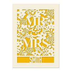 a card with the words mr and mrs on it in white paper, surrounded by yellow flowers