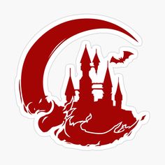 a red and white sticker with a castle in the moon on it's side