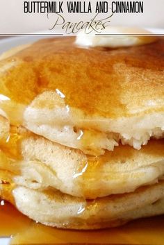 a stack of pancakes covered in butter and syrup