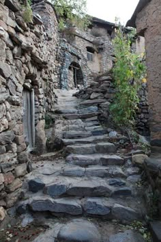 stone steps lead up to an old building