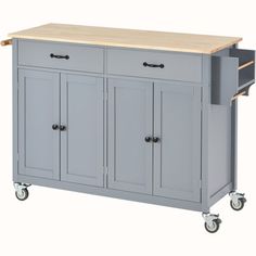 a gray kitchen island with two drawers and a wooden top on casteors, against a white background