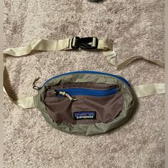 Brand New Without Tags Patagonia Fanny Pack. It Can Fold Inside Its Self For Easy Travel And Has Adjustable Straps. Two Pockets With Lots Of Space. Patagonia Fanny Pack, Fanny Pack Outfit, Granola Girl, Easy Travel, Patagonia Womens, Granola, Fanny Pack, Color Purple, Patagonia