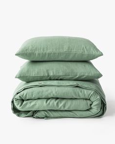 three pillows stacked on top of each other