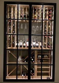 a wine cellar filled with lots of bottles