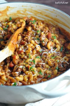 a large pot filled with some taco meat and beans