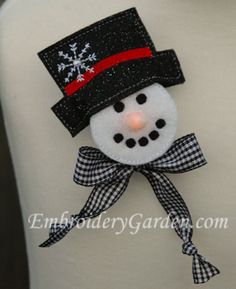 a snowman with a top hat and bow tie