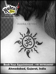 the back of a woman's neck with an omastha tattoo on it