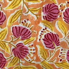 an orange and pink floral print fabric