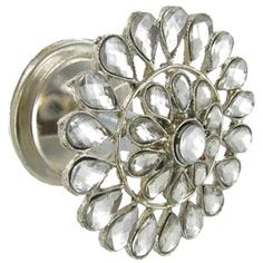 an image of a metal knob with crystal stones on it