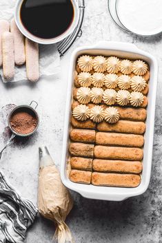 a pan filled with pastries next to other baking supplies