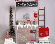 an old fashioned christmas display with cookies and santa's sleigh on it