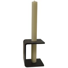 a candle holder with a single pillar on the top and two candles in the middle