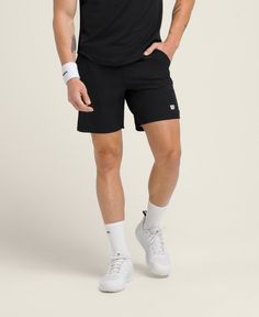 The Tournament Pro Short is Wilson's lightest-weight, on-court short. Ultralight and ultra-technical, the stretchy fabric has great ventilation. The knit waistband has a mesh-like texture and a built-in drawcord, so it keeps a strong hold without feeling restrictive. These shorts are unlined and designed to pair with your favorite compression liner. | Wilson Tournament Pro Short 7" Unlined - Size 2XL Tennis Activewear With Built-in Shorts, Casual Tennis Activewear With Built-in Shorts, Sporty Black Tennis Shorts, Black Stretch Tennis Shorts, Black Stretch Shorts For Tennis, Black Casual Tennis Shorts, Casual Black Tennis Shorts, Black Moisture-wicking Activewear For Tennis, Casual Breathable Activewear For Tennis