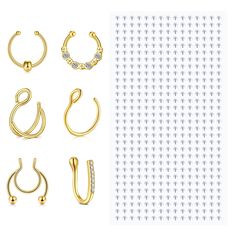 four pairs of gold hoop earrings with diamonds on the bottom, and three different designs