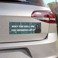 a sticker on the back of a car that says, why the hell are you honking local?