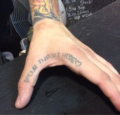 a hand with the words you can't that hero written on it