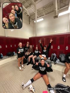 a group of young women sitting on the floor in front of lockers with their arms up