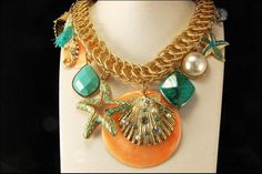 "This is a very beautiful, vintage and unique SHELL FAUX PEARL GOLD TONE necklace. The necklace has a marvelous, chic style with shells shape dangle, art glass, enamel decoration and gold tone metal. The necklace has a very extravagant and elegant feel to it. It measures 15\" long. The necklace is in very good condition. 0.14 D021121007" Vintage Gold Shell Jewelry, Handmade Vintage Gold Shell Necklace, Vintage Gold Beach Jewelry, Vintage Gold Jewelry For Beach, Vintage Gold Jewelry For The Beach, Vintage Gold Necklace For Beach, Dangle Art, Pearl Art, Dangle Necklace